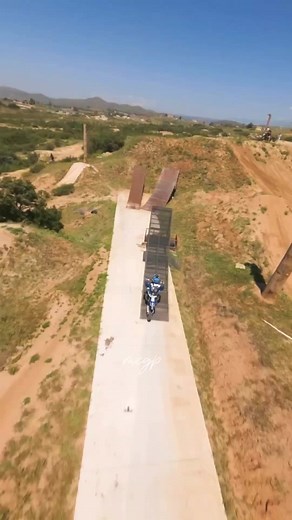 Motocross Rider Executes Epic Stunts on Dirt Track