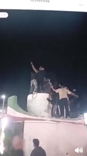 People topple statue in Iran after US, Israeli assault kills supreme leader People cheer while toppling a statue in the Iranian city of Dehloran, a video filmed over a mobile phone footage showed on March 1, 2026 after US and Israeli attacks killed Iran’s supreme leader and threatened to destabilize the wider Middle East. Reuters confirmed the location as Dehloran from the statue, statue base and utility poles seen in the video which matched corroborating video and file images. Three persons wea