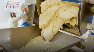 How pizza giant Papa Johns makes 4 million dough balls a week