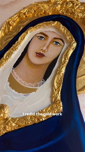Vivian Imbruglia on Instagram: "I painted this icon about 17 years ago in memory of our beloved Ashley Scanlon-Smith. The icon contains a first-class relic of St. Maria Goretti, and it was recently decided to move it from the youth center to the church, allowing more people to venerate it. Before the move, I made some touch-ups to the icon. I brought it home to repaint the faces, add more gold, and include roses on the arms of St. Maria Goretti, reflecting her deep devotion to the rosary. Yester