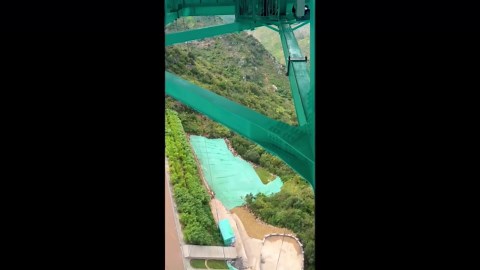 Dare to try bungee jumping from 625-metre tall bridge WITHOUT a rope?