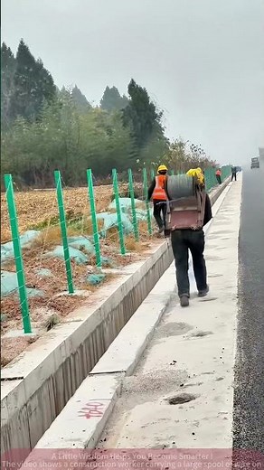 Heartwarming: Workers carrying a spool of wire on their back pull wires, showing their persistence!