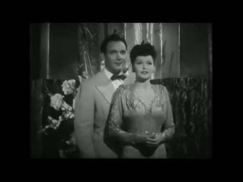 Patsy O Connor and chorus sing and Mel Torme plays the drums