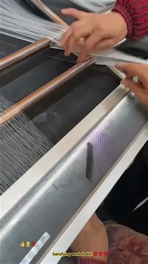 Very skillful worker weaving thread