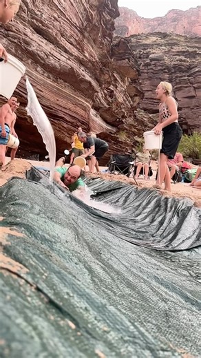 Slip-N-Slide, Grand Canyon edition 💦 . . . . #slipnslide #fun #grandcanyon #thegrandcanyon #grandcanyonnationalpark #raftingtrip #camping #vacation #bestvacation #familytrip #river #coloradoriver #westernriver #westernriverexpeditions #rivertafting #outdoors #greatoutdoors #getoutside | Western River Expeditions