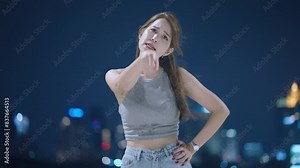 Shot of young beautiful asian woman shouting and yelling at camera showing human emotion gesture, frustrated woman, woman in bad mood unhappy, not pleased unsatisfied, night shot with nice city view