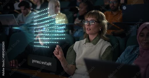 Female University Student Wearing VR Glasses Uses AR Gestures in a Lecture Hall, Selecting AI Course Modules. Holograms of Digital Brain and Neural Network. Immersive Learning, Data Visualization
