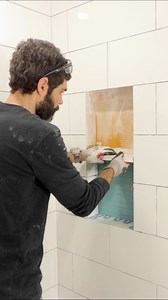 30K views · 60 reactions | Shower niche shelf tips…I apply thin-set mortar to the top of tiles inside my niche. Then I carefully set the shelf. Be careful. It’s very easy to chip tiles when doing this. I ensure the shelf is level left to right. But I pitch it slightly (1/16” at most) so water drains toward the shower. Make your shower remodel easier with our Video Library at homerepairtutor.com #tileshower #bathroomremodel #diy #homerepairtutor | Home Repair Tutor | Facebook