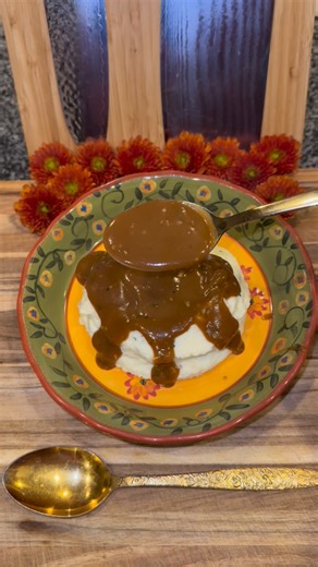 Mashed Potatoes & Gravy🥔🤎 Start out by washing and peeling 7 pounds of Russet or Yukon Gold Potatoes and chop them into large chunks. Then add them to a large pot and submerge in chicken broth with a nice amount of salt. Boil them until fork tender then use a potato ricer to mash them (or a hand held potato masher if you don’t mind lumps. Then add in: -10 tablespoons of melted butter (mixed with 1 tablespoon of minced garlic) -1/2 cup of heavy whipping cream -1/2 cup of 2% milk -One 5 ounce pa