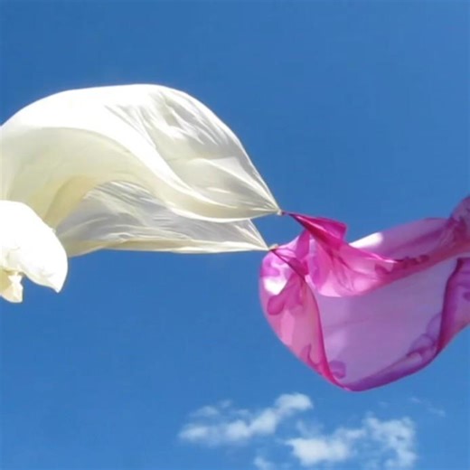 Strong winds let silk fly across the sand dunes