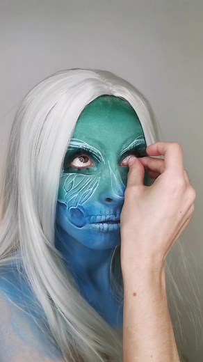 Fantasy Makeup Transformation with Blue Face Paint