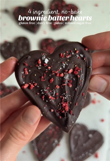 These 4-ingredient brownie batter hearts are gluten-free, dairy-free, paleo, and refined sugar-free—aka the perfect easy Valentine’s Day treat. Rich, fudgy, and no baking required! Ingredients •1/2 cup almond butter (or other preferred nut or seed butter) •1/4 cup pure maple syrup •1/3 cup cocoa powder •5–6 oz dark chocolate (about 1 cup; I use dairy-free, refined sugar-free chocolate) Instructions 1. Melt the dark chocolate and set aside. 2. In a bowl, combine the almond butter, maple syrup, co