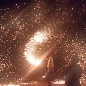 A family in Kisii use lit steel wool to create fireworks as they usher in #NewYear2022 | Standard Digital