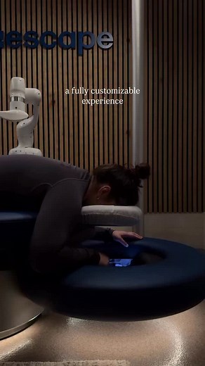 Aescape is built on cutting-edge robotics and intelligent software, blending biometric scans, heated robotic arms, and user-controlled adjustments to deliver a truly personalized massage experience. And the customization doesn’t stop at pressure and focus points. Choose from curated playlists and immersive visual screens to set the perfect atmosphere. Whether you unwind to the sound of rain or find calm watching snow drift across the screen, every detail is designed to support your unique needs 