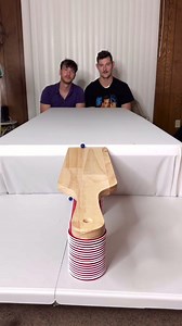 Slowest marble trick shot lands perfectly in the hole