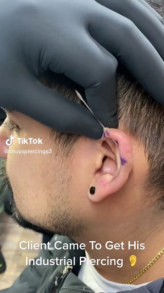Men's Industrial Piercing Process with Client Trust & Support