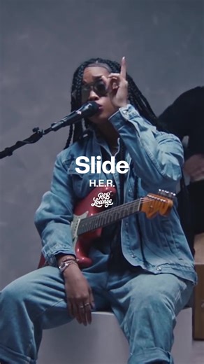 H.E.R. Slide Live Performance: Soulful R&B Music Experience