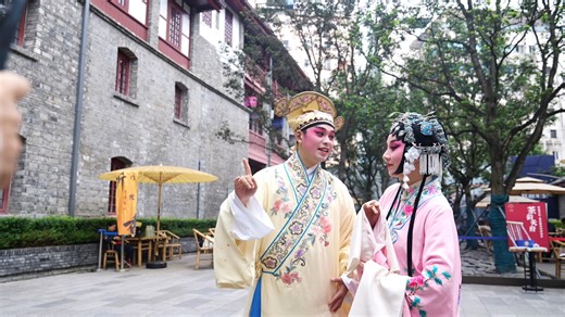 With beautiful old architecture as their backdrop, a pair of opera performers gave a show on a pedestrian street of Chengdu that captured a lot of public attention. With a growing sense of excitement, CGTN host Julian Waghann showed no hesitation in catching up with them for pictures. Young people are increasingly interested in learning about traditional Chinese opera and the culture behind it nowadays, so encounters with opera performers like these on any city street won't seem unusual any more