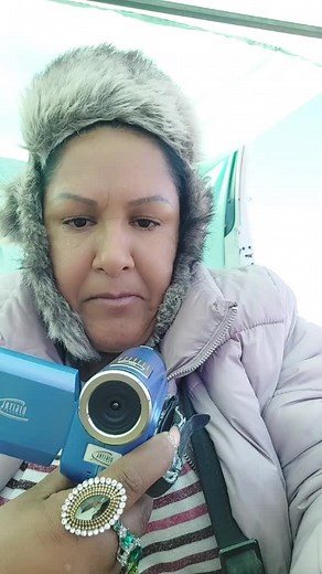 Inspecting a JVC Camcorder in Outdoor Setting