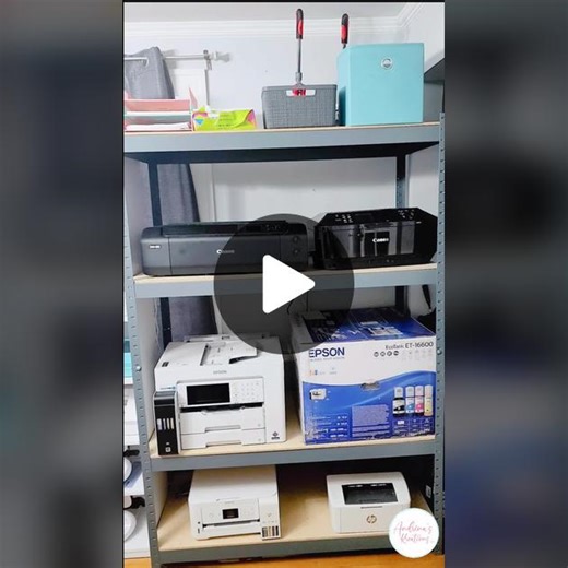 Another popular question? What Stand I use for all my printers ? A heavy duty metal rack from menards Canon pixma pro 200 for that extra umph glossy projects Canon mx922 Edible printing Ecotank 16600 everyday printing I highly recommend Ecotank it saves money on ink .. (I have 2 the one in the box is the backup) Ecotank 2760 for sublimation Hp laser jet pro m15w monochromatic laser printer for foiling @epson @hp #Andrinaskreations #printerstand #homebusiness