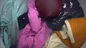 Washing clothes in a top loader washing machine