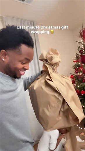 Isaiah Charles on Instagram: "Of course we waited until the last minute to wrap these gifts 😂 #christmas #family"