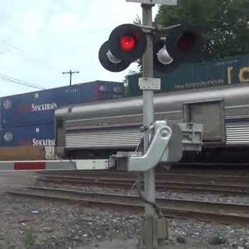 BNSF Train Blows The Doors Off of Amtrak Train