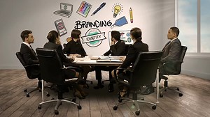 Premium stock video - Business people looking at digital screen showing branding