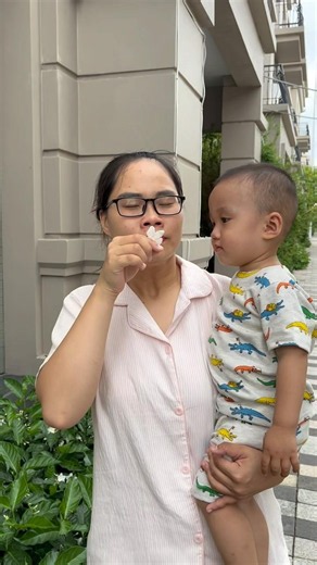 Teasing a Mother and Her Child While They Pick Flowers #baby #shorts #cute