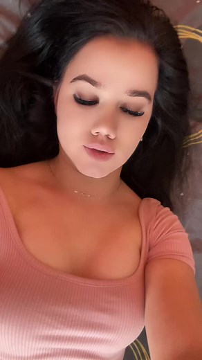 Captivating Bedroom Poses of a Young Woman