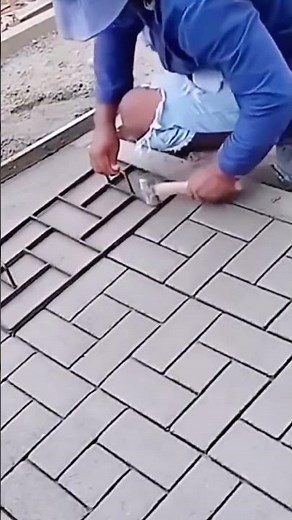 The process of molding patterns on cement flooring using template frames