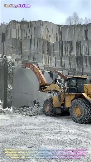Quarry Operations: Heavy Loader Pushing Large Stone Blocks from the Rock Face 🏗️🪨