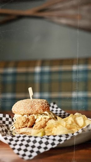 Meet Big Daddy Cane’s. Crispy fried tenders, coleslaw, fries, and ‘raised sauce’ on a sesame bun. | The Good Sport