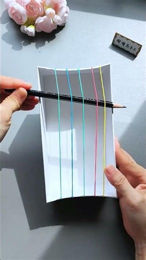 I made my own musical instruments using rubber bands and paper boxes, but I didn’t expect that I