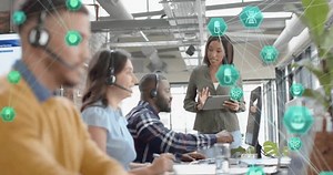 Customer service team working in office with healthcare icons and network animation. Business, teamwork, collaboration, technology, support, communication