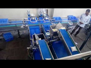 Tranqvolt - Dairy Automation - crate filling with Milk Pouches