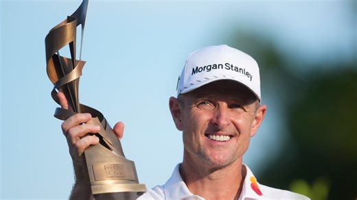 FedEx COO Richard Smith presents Justin Rose with FedEx St. Jude Championship trophy