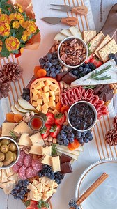 Fall grazing at its finest! Nothing says cozy season like a board filled with my fave flavors. Here are some seasonal (and non-seasonal) must-haves I used on this fall build: Aged cheddar Brie Gouda Asiago w/ rosemary Sea Salt Multigrain crackers Concord grapes crisp pear slices strawberries Maple glazed pecans pistachios Salami sliced soppressata Dried raisins cherries apricots Garlic stuffed olives Caramel filled chocolates Fig jam honey Perfect for a cozy night in, hosting friends, or even yo