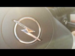How to program a remote control in Opel Astra?
