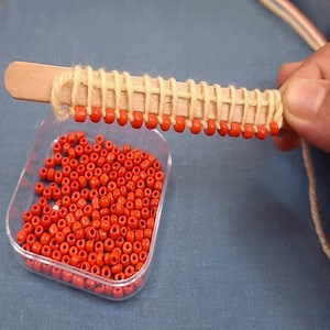 4.5M views · 10K reactions | Easy Woolen Flower Making with Ice cream Stick Via Cherry Blossom | Dian Embroidery | Facebook