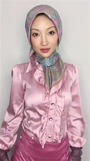Blue rose colored outfit, blouse and hijab