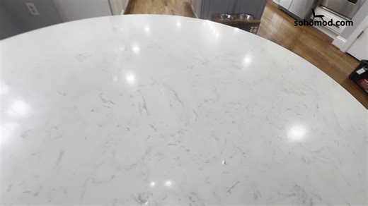 Nolan Modern Round Dining Table Review by ACME | Stunning Marble-Top Table for Kitchen & Dining Room 🛒👉Shop now: https://www.sohomod.com/nolan-round-dining-table-white-salvage-dark-oak.html Transform your dining space with the Nolan Marble and Wood Round Dining Table from ACME. This stunning piece combines a pristine white marble tabletop with a robust wooden base in a rich salvage dark oak finish, creating a striking contrast that draws the eye. The table's round design encourages conversatio