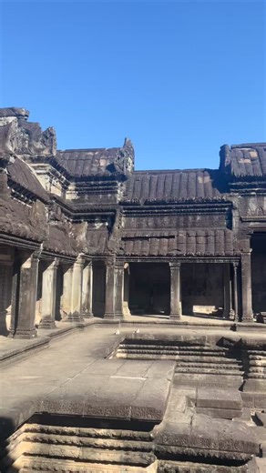 Angkor Tour on Instagram: "Angkor Wat is an extraordinary architectural masterpiece that showcases the brilliance and ingenuity of the ancient Khmer civilization. Built entirely from sandstone, the temple features a perfectly balanced and symmetrical design that symbolizes Mount Meru, the center of the universe in Hindu belief. Its soaring central towers, long galleries, and vast moat reflect advanced engineering and artistic skill. The walls are adorned with intricate bas-relief carvings depict