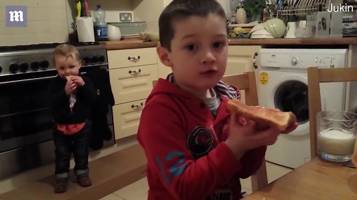 Excited kid falls from chair after hearing ice cream truck's song
