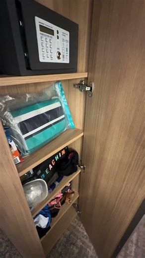 One thing I love about cruise cabins is how they hide extra storage in the smartest places.