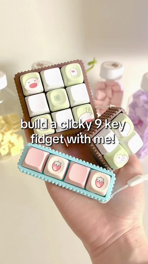 building our “lucky buddies” 9 key fidget with clicky switches! customer chose the brown bubble base and clicky switch option, check out more on kreamykeys.com! #keyboard #cozygaming #mechanicalkeyboard #fidgettoys #keyboardasmr #keyboardfidget #tiktokshop #smallbusiness #creamykeyboards #deskdecor #asmr #adhd #sensory #cozycorner #studioghibli #theboyandtheheron