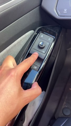 Weirdest car window switch. 3 buttons!