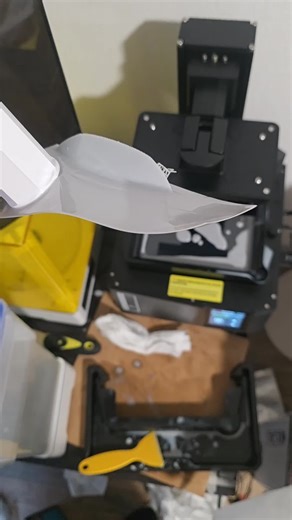 First resin print failure, not surprised this part had 0 flat edges to print on, but the other parts in thr print finished correctly! Was able to use one of the test handles for the Modular Saber System to clean the tank really easily. #3dprinting #fail #resin #failvideo #cleaning