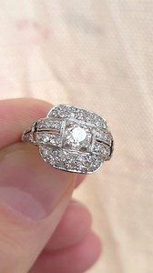 French Art Deco at its finest. 🇫🇷✨ A luminous diamond ring where geometry meets grace—crafted in 18k white gold and platinum, set with a hypnotic old mine cut centre and a constellation of antique diamonds. Elegant, architectural, and endlessly wearable, whether as a timeless engagement ring or a refined anniversary statement. True vintage brilliance that never dates. #ArtDecoRing #FrenchJewellery #AntiqueDiamond #OldMineCut #VintageEngagementRing TimelessElegance FineJewelry PlatinumRing Anti