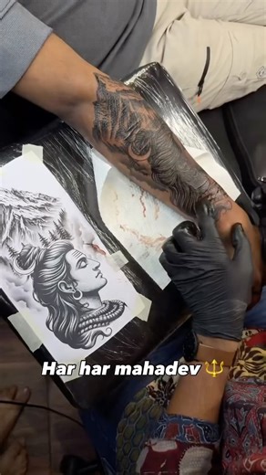 J’Tog Tattoos (Est : 2015) on Instagram: "“Pure power. Pure devotion 🔱🔥 This man chose a big, powerful Mahadev tattoo blended with a fully customised mandala — intense energy, deep belief, and full excitement from start to finish. When faith meets fierce art, the result speaks loud ✨ Ink crafted with pride at J’Tog Tattoo, Surat 📞 8141870214” #igreach #iggrowth #explore #MahadevTattoo #MandalaTattoo #CustomTattoo #PowerInk #jtogtattoo #trendingreels #viralreels #tattooreels #instagram #tattoo